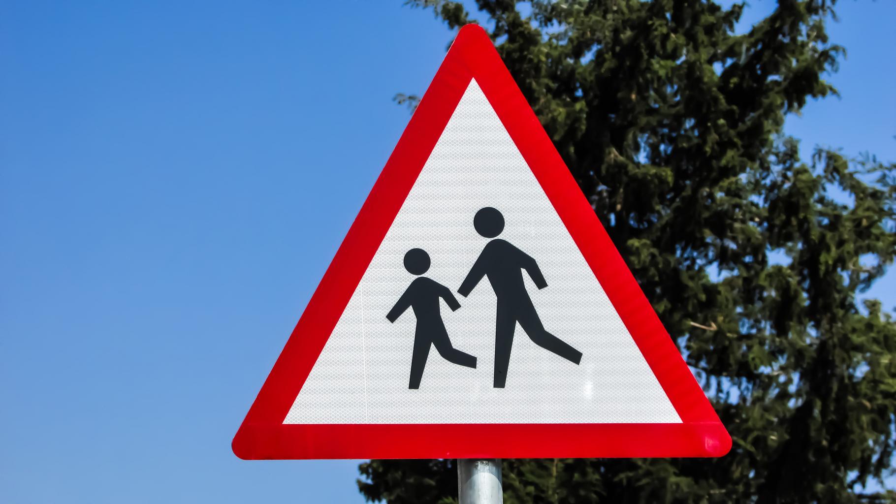 Warning school children crossing